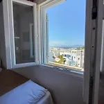アパートホテル マノス ルームズ
